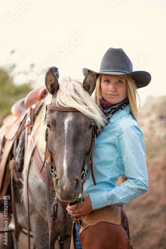 cowgirl with rocky mountain horse