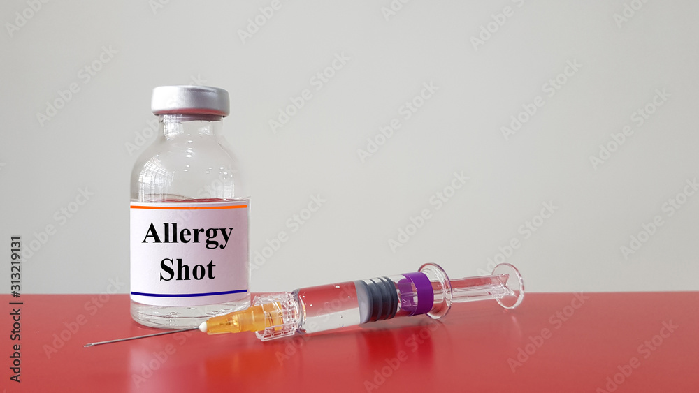 Allergy shot in bottle and syringe for injection. Allergen