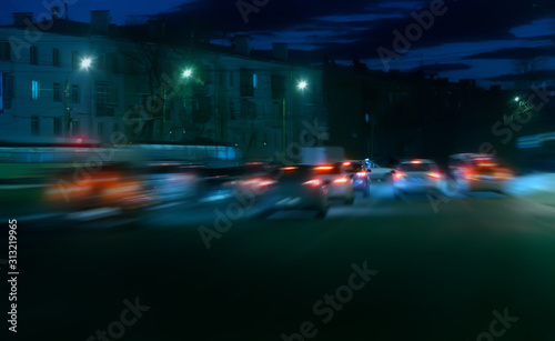 Blurred motion of cars on a winter night
