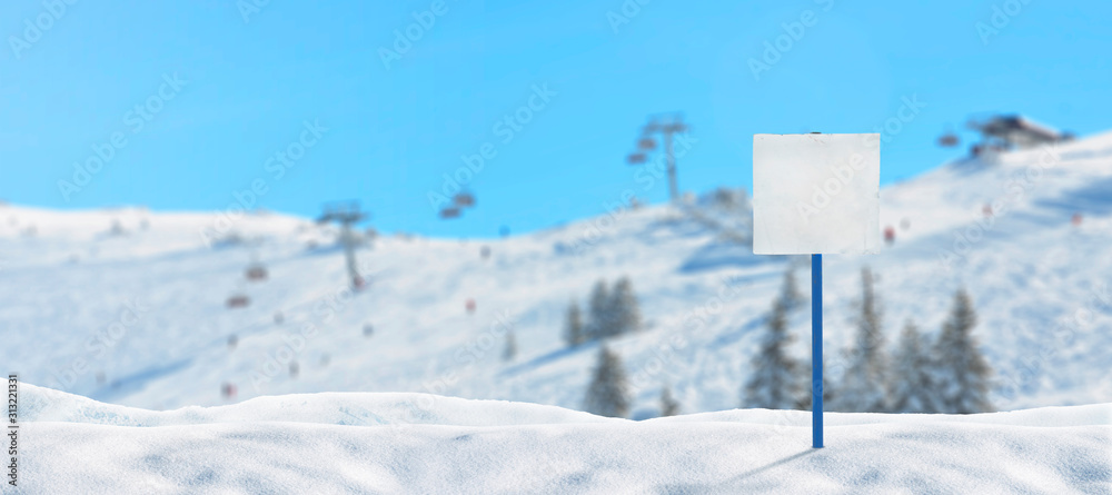 Blank ski signost on ski resort mockup. Ski lifts and slopes in background Blank ski signost on ski resort mockup. Ski lifts and slopes in background