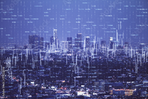 Financial graph on night city scape with tall buildings background double exposure. Analysis concept. © peshkova