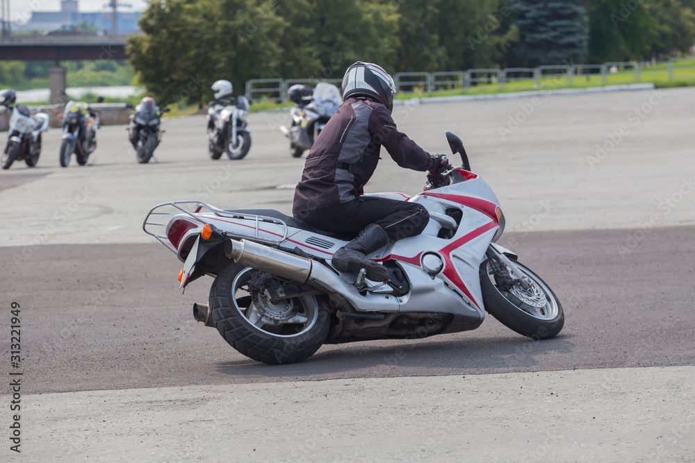 Motorcyclist rides a motorcycle