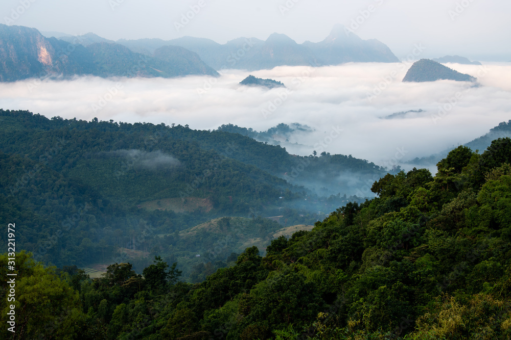 White mist in the morning on the mountain range White mist in the morning on the mountain range