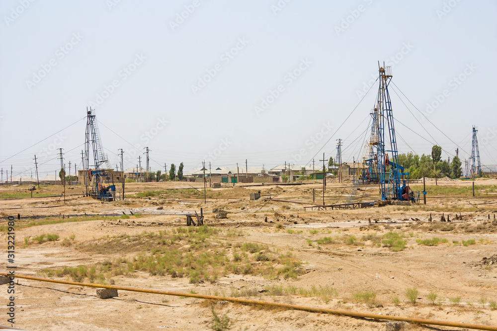 Oil pump pumping oil in former oil fields. Equipment of the oil industry Baku, Azerbaijan