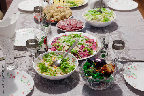 Festive table. Salads and snacks. New year in Russia.