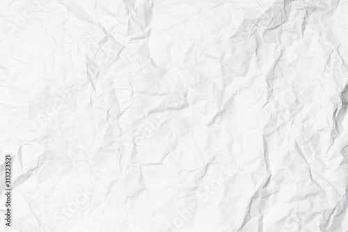 A white crumpled paper texture overlay background