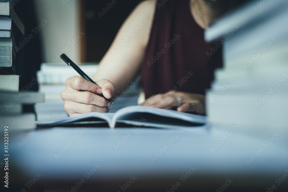 high school,university student study.hands holding pencil writing paper answer sheet.sitting lecture chair taking final exam attending in examination classroom.concept scholarship for education abroad high school,university student study.hands holding pencil writing paper answer sheet.sitting lecture chair taking final exam attending in examination classroom.concept scholarship for education abroad