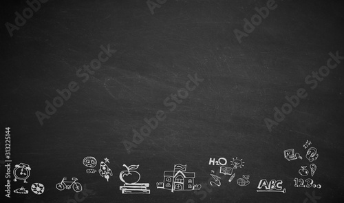 back to school , written on a blackboard.