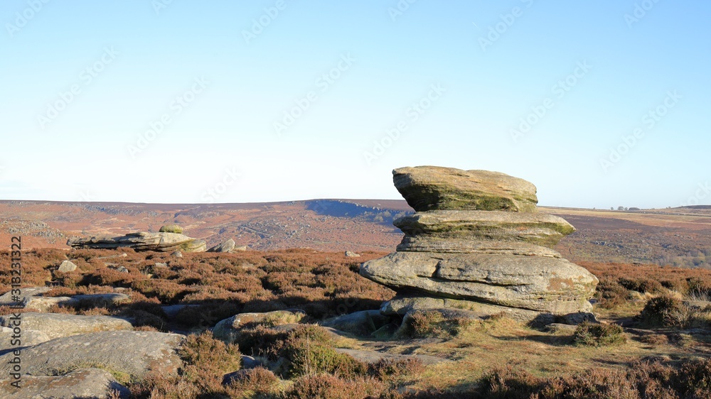 a gritstone tor on Hathersage Moor in the Peak District, UK