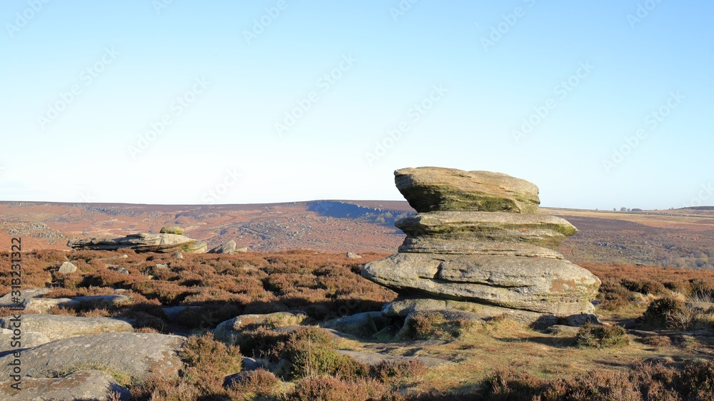 a gritstone tor on Hathersage Moor in the Peak District, UK a gritstone tor on Hathersage Moor in the Peak District, UK