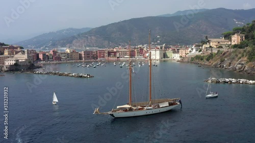 Aerial footage of Yacht in Sestri Levante - Silent Bay, Liguria, Italy - Sunny summer day 4k