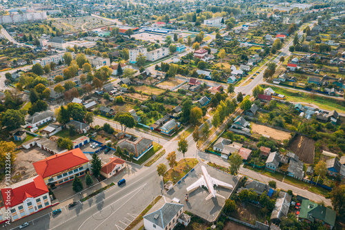 Chachersk, Gomel Region, Belarus. Aerial View Of Skyline Cityscape. Aircraft It Is Mounted On Chassis On One Of Squares Of Town. Historical Heritage In Bird's-eye View