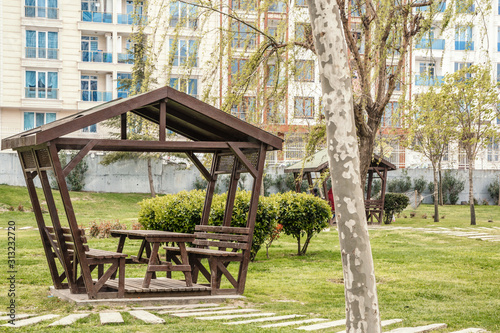 summer wooden gazebo for rest and picnic in one of the parks of Istanbul photo