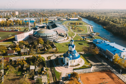 Pinsk, Brest Region Of Belarus, In The Polesia Region. Pinsk Cityscape Skyline In Autumn Morning. Bird's-eye View Of Church of the Nativity of the Blessed Virgin Mary And Sports Stadium