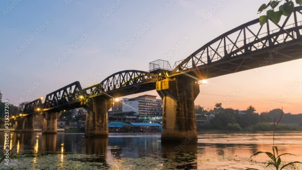 Time lapse of Bridge over the River Kwai night to day. Is an important landmark and a tourist destination. Time lapse of Bridge over the River Kwai night to day. Is an important landmark and a tourist destination.