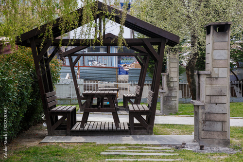 summer gazebo for rest and picnic next to the barbecue in one of the parks in Istanbul photo