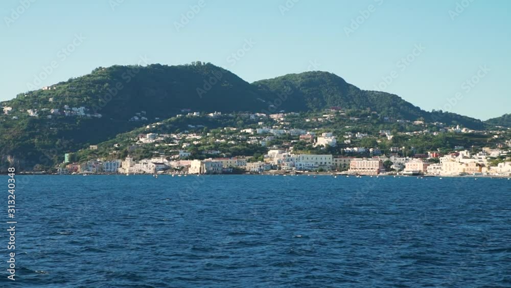 Beautiful Landscape View of Ischia Island from a Ferry. Concept of Holidays, Vacations and Travel in Europe Beautiful Landscape View of Ischia Island from a Ferry. Concept of Holidays, Vacations and Travel in Europe