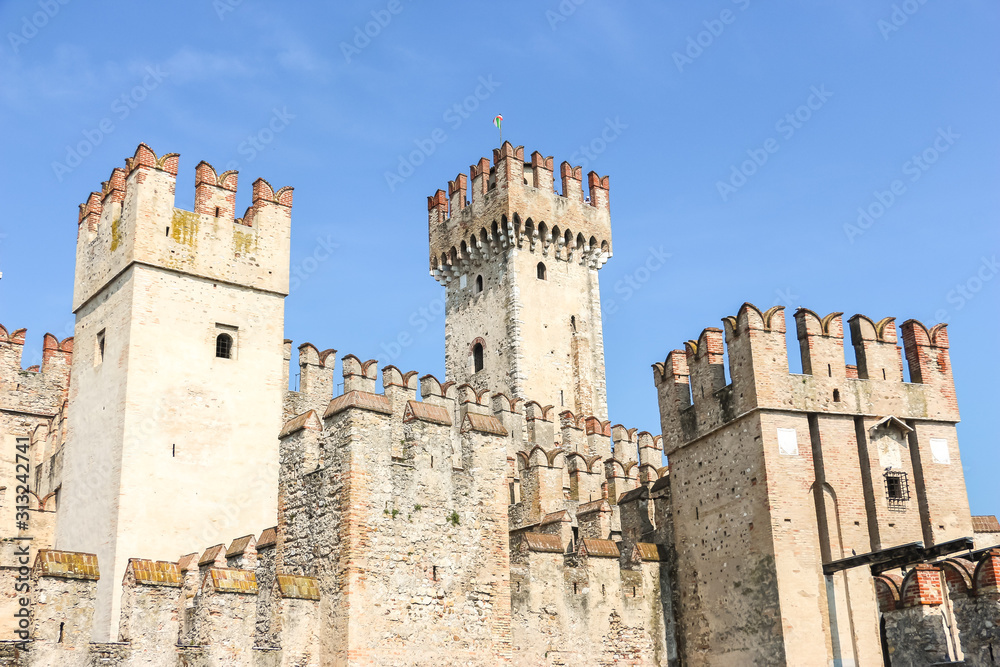 Sirmione, Italy. Beautiful view of Scaligero Castle in sunny day.