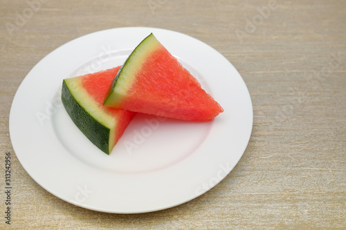 Slices of watermelon on a table