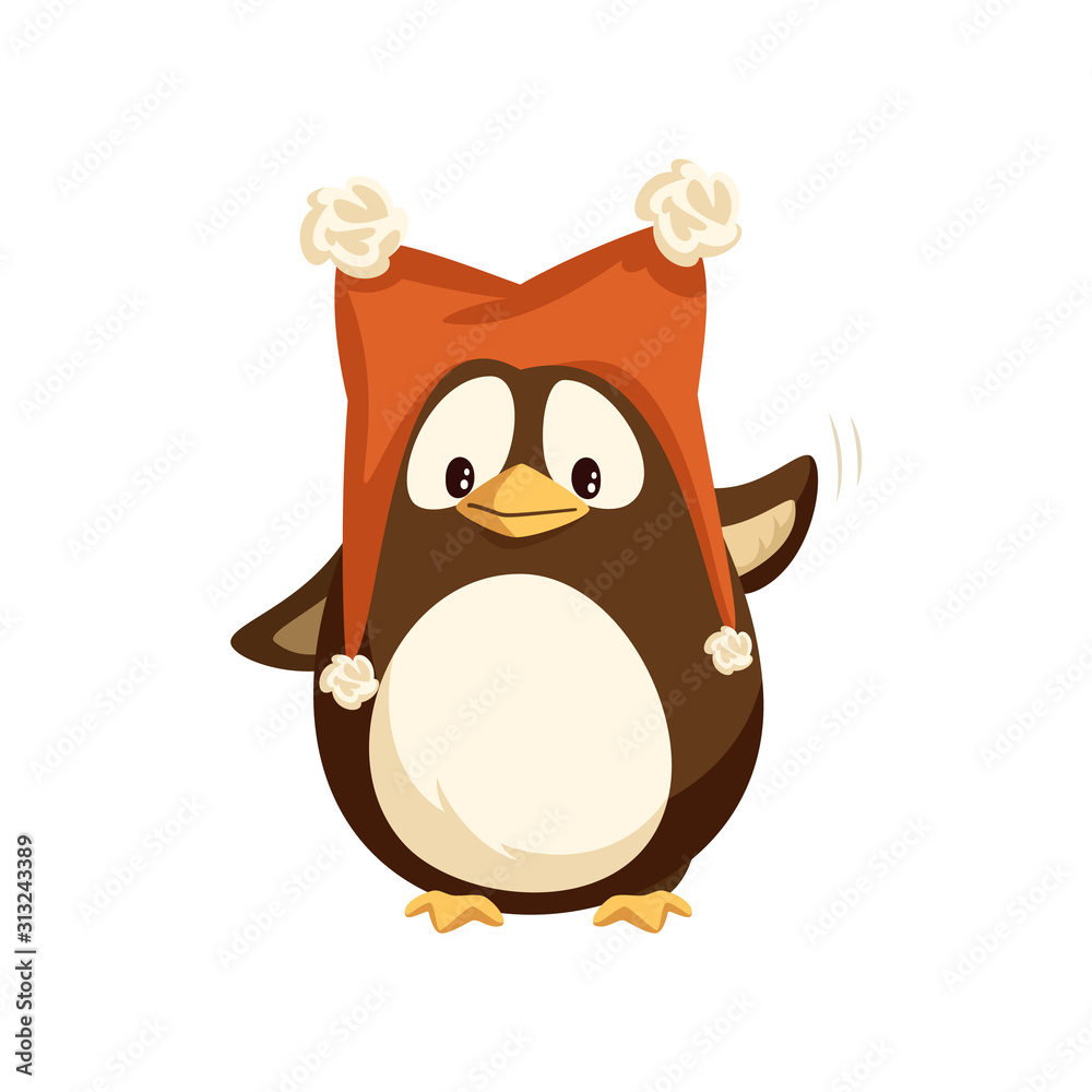 Fototapeta premium Cheerful standing penguin in funny hat with furry balls and waving hand. Animal in big red cap with pompons in flat style isolated on white vector