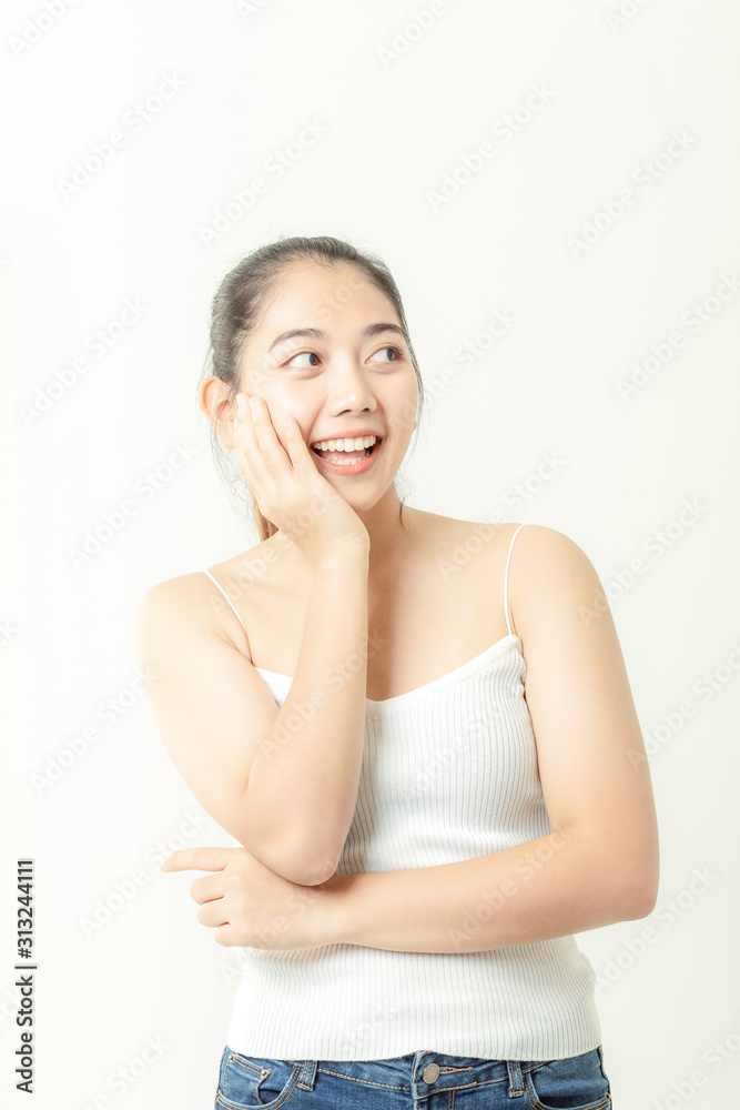 Asian woman is showing off pretty skin. Asian beauty skin care woman looking at side. Asian woman is showing off pretty skin. Asian beauty skin care woman looking at side.
