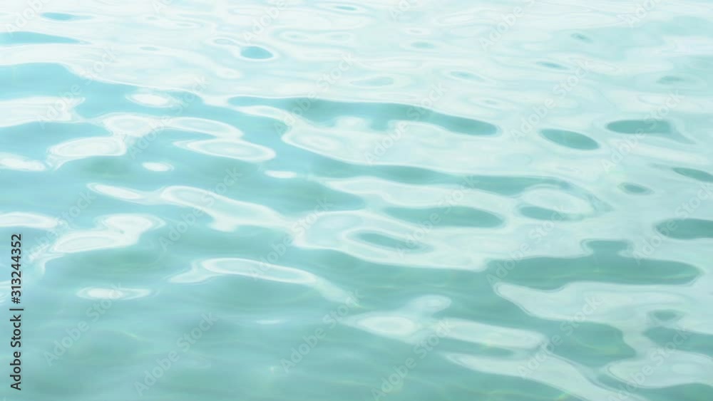 Beautiful sunny blurry soft surface of calm sea water. Organic abstract video background. Slow motion full hd video footage. Beautiful sunny blurry soft surface of calm sea water. Organic abstract video background. Slow motion full hd video footage.