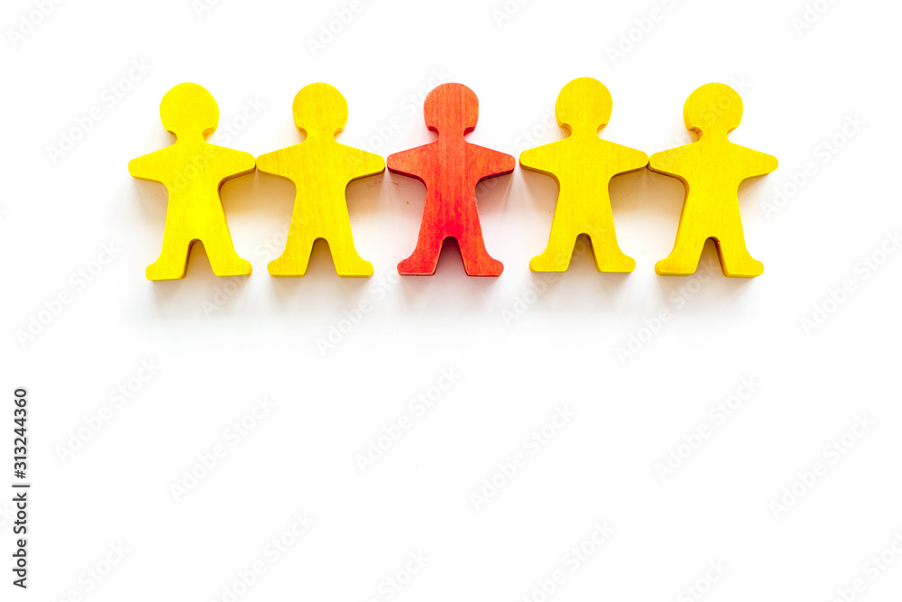 Leader concept. People cutuots - red figure against others on white background top-down copy space