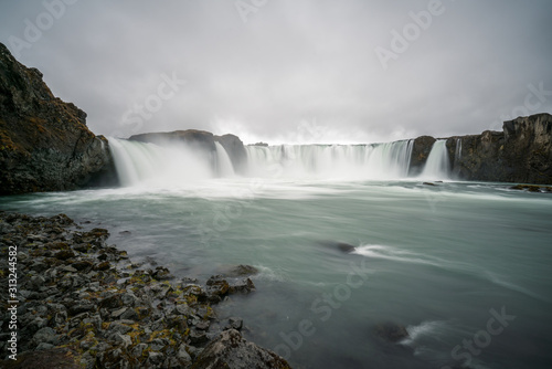 Closeup shot of Godafoss waterfall near Akureyri in the Icelandic highlands. Icelandic and traveling concept.