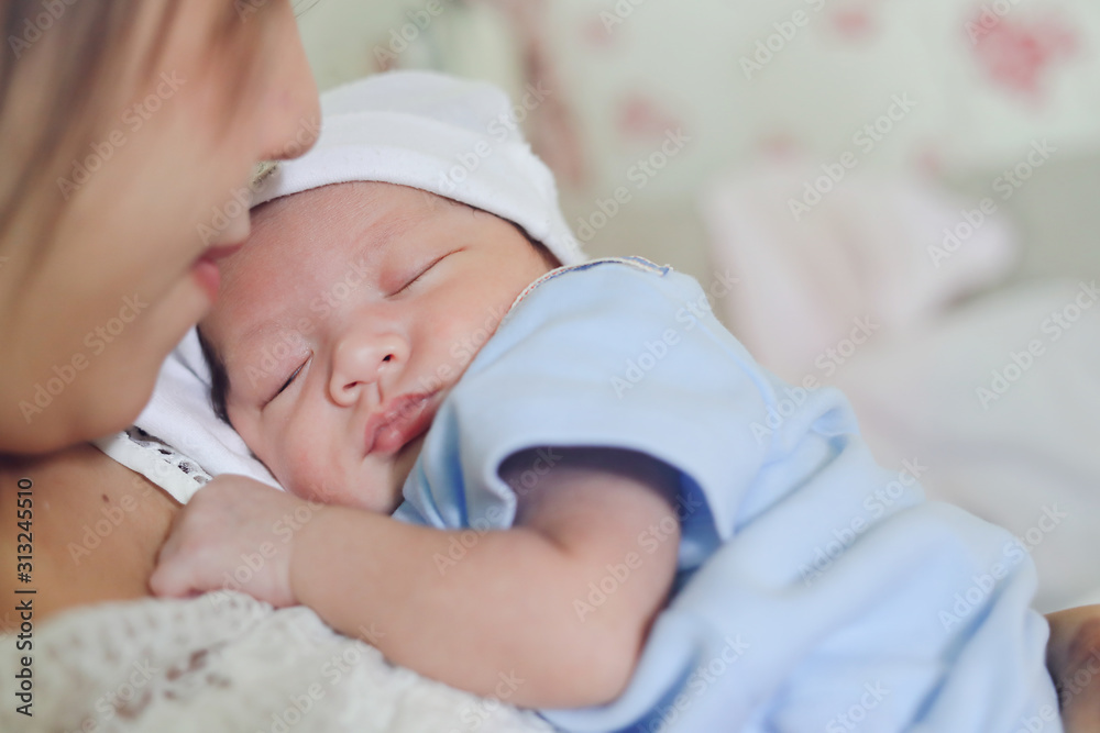 little newborn baby sleeping embrace on mother with love little newborn baby sleeping embrace on mother with love