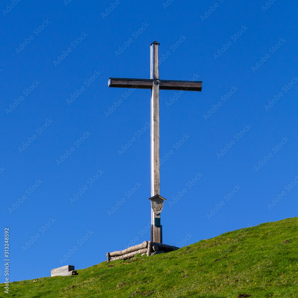Summit Cross of Mount Rauheck, 1590 m in Bavarian Prealps, located near Ohlstadt, Upper Bavaria, Germany. Europe Summit Cross of Mount Rauheck, 1590 m in Bavarian Prealps, located near Ohlstadt, Upper Bavaria, Germany. Europe