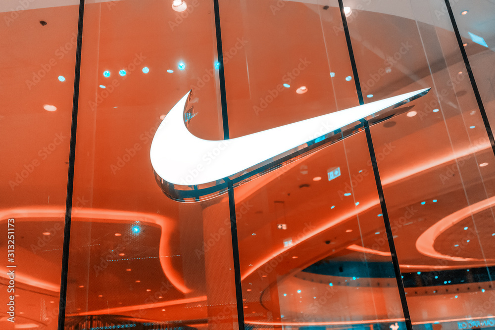 28 November 2019, UAE, Dubai Mall: Nike logo close-up at sportswear store  Stock Photo | Adobe Stock