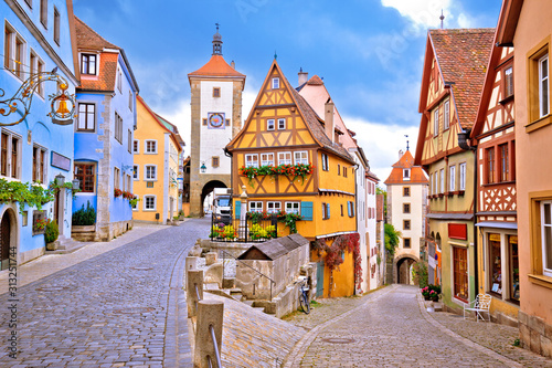 Cobbled street and architecture of historic town of Rothenburg ob der Tauber view photo