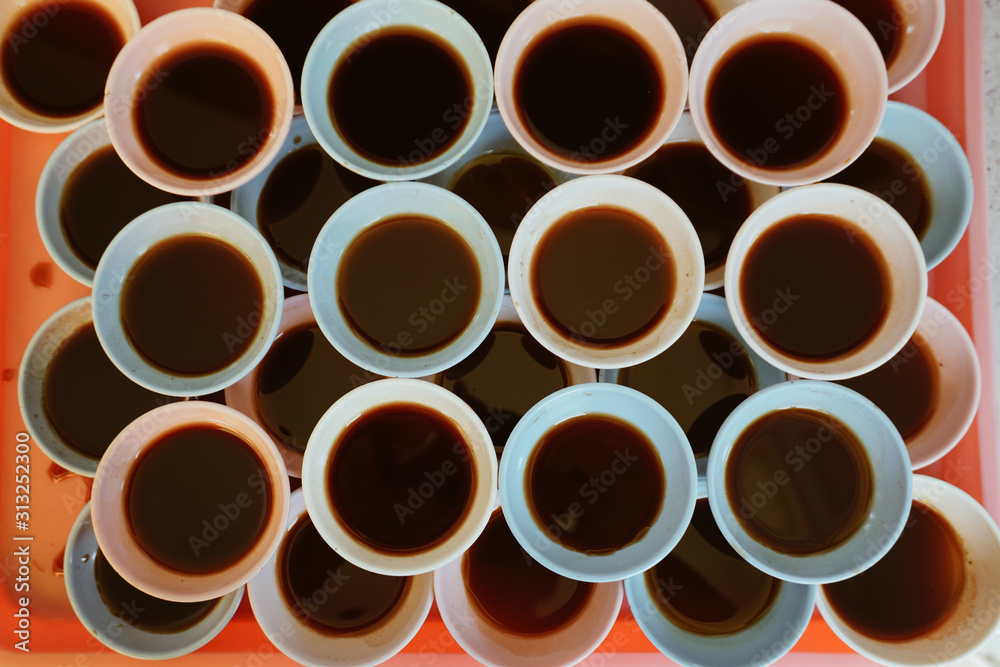 Bowls of soya sauce at street restaurant