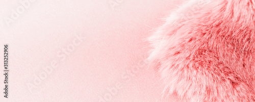 Faux fur detail flat lay monochrome pink color background for social media
