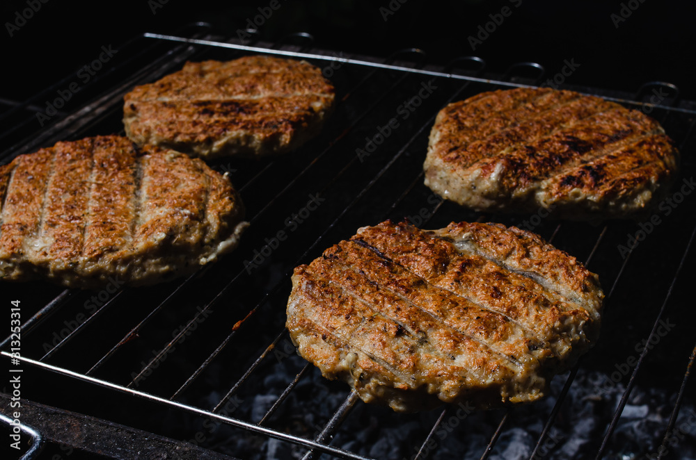 chicken burger composition on a bbq grill chicken burger composition on a bbq grill