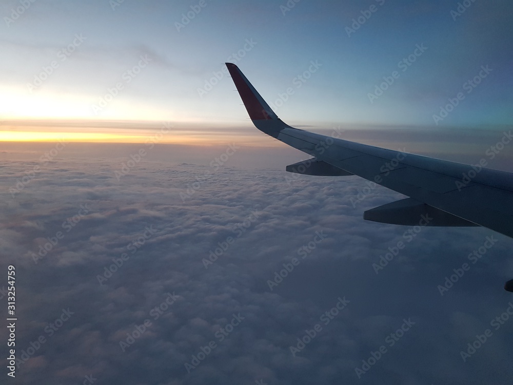 Airplane flies in the evening sky Airplane flies in the evening sky