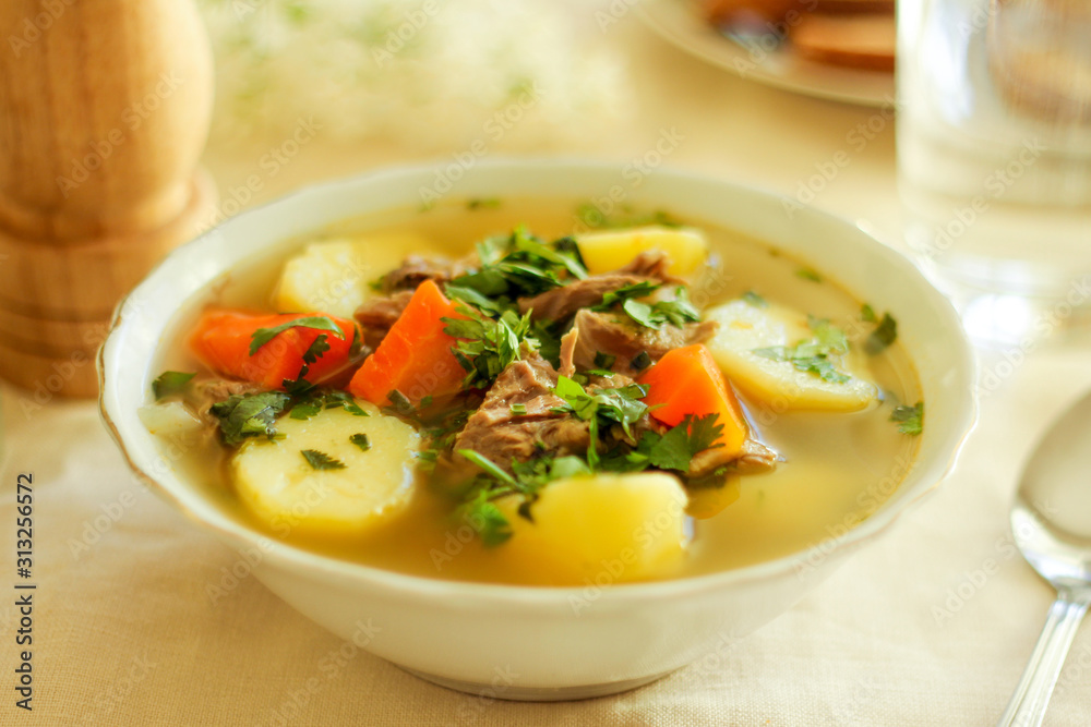Shurpa soup, Lamb soup, oriental cuisine, close up Shurpa soup, Lamb soup, oriental cuisine, close up