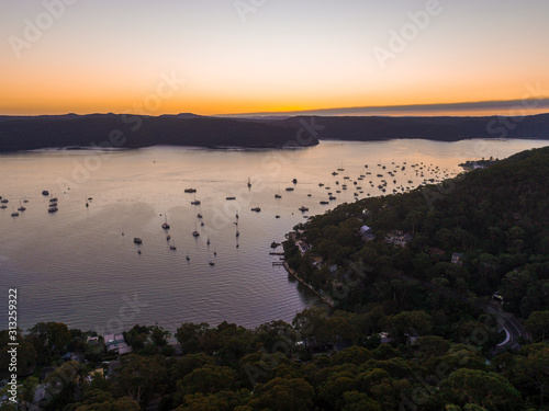 Boats sailing out of a channel in Pittwater, Sydney