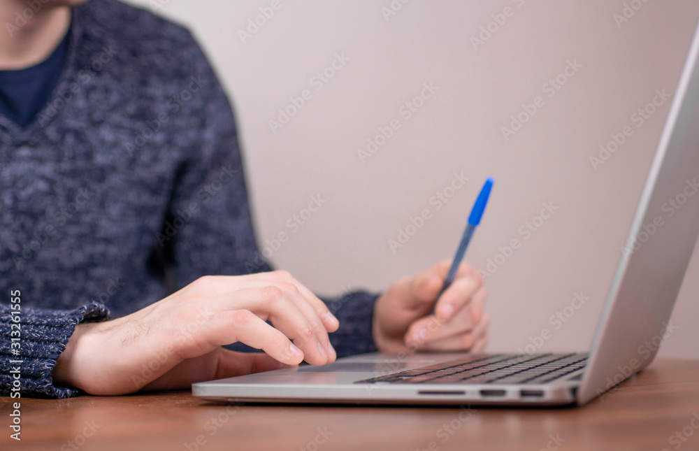 Businesswoman at the bar working on a laptop hands close up Businesswoman at the bar working on a laptop hands close up
