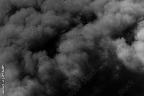 Dark sinister smoke clouds from explosion photo