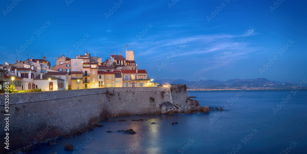 Panoramic view of Antibes at dusk, France 