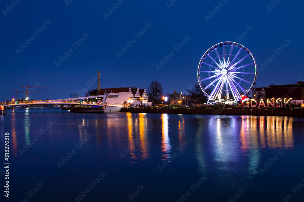 Fototapeta Ferris wheel and bridge in Gdansk, Poland