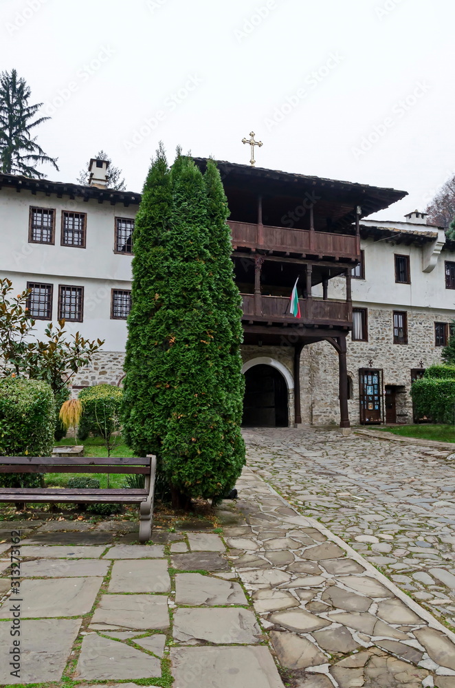 The entrance to the courtyard of the  Troyan Monastery was originally founded in 1600 and has been restored to its present form in 1830-1865, village Oreshak, Bulgaria