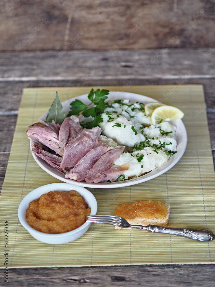 Pike river fish caviar and sandwiches on a wooden rustic ancient background. Pike river fish caviar and sandwiches on a wooden rustic ancient background.