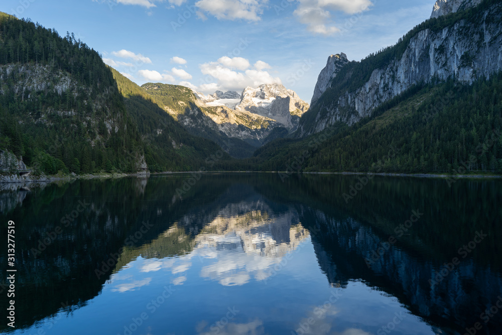 Lake Gosausee is one of the most beautiful places in Austrian Alps, The scenery around is just breathtaking, you can see beautiful mountains around and also the Dachstein glacier. Tourism in Austria Lake Gosausee is one of the most beautiful places in Austrian Alps, The scenery around is just breathtaking, you can see beautiful mountains around and also the Dachstein glacier. Tourism in Austria