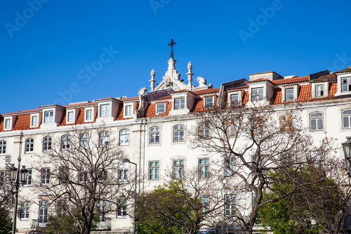 The historical buildings around King Pedro IV Square also called Rossio Square located in the Pombaline Downtown of Lisbon photo