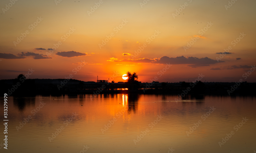 Lacul Morii, Bucharest, Romania - A beautiful sunset over the lake in high contrast