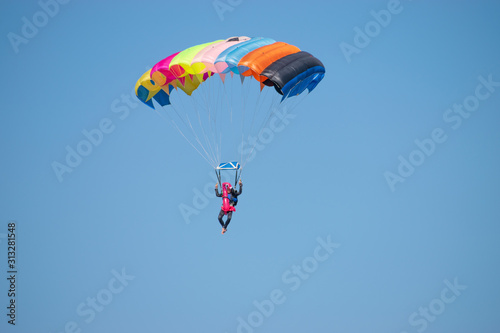 Bucharest/ Romania - AeroNautic Show - September 21, 2019: Skydivers getting ready to land in water