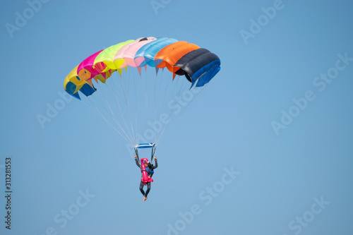 Bucharest/ Romania - AeroNautic Show - September 21, 2019: Skydivers getting ready to land in water