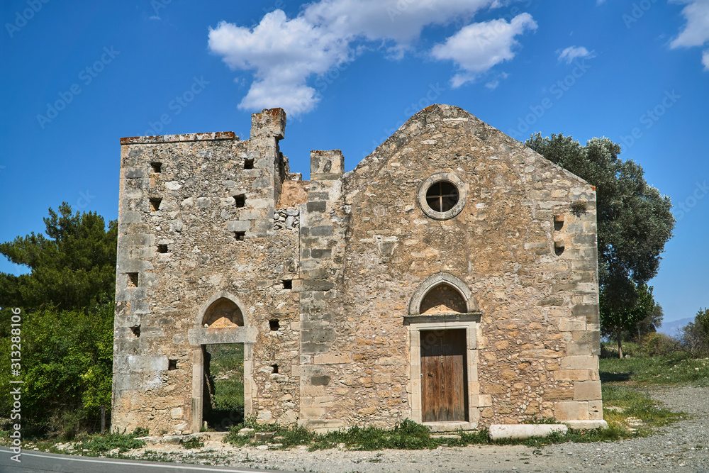 ruins of an Orthodox, historic church on the island of Crete.